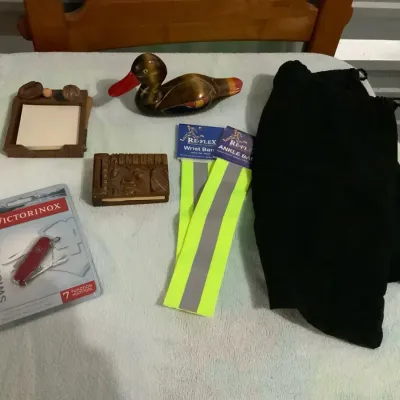 Mixed Collectibles & Accessories Lot – Victorinox Swiss Army Knife, Duck Figurine, Wooden Notepads &