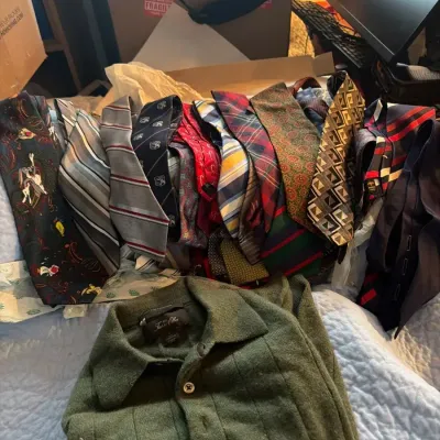Charming collection of vintage household linens featuring colorful hand-embroidered and appliquéd fl