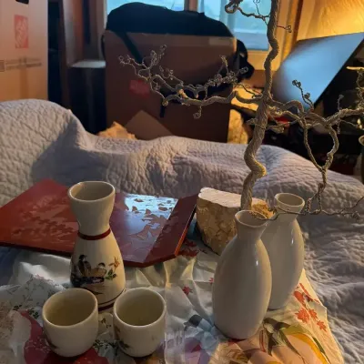 Asian-Inspired Décor Lot with Sake Set, Wire Tree and Decorative Textiles