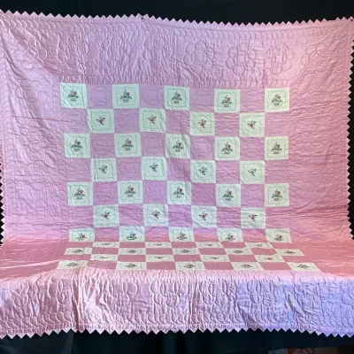 Pink & White Embroidered Quilt