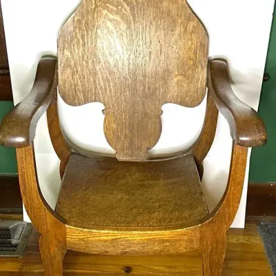 Antique Stomps-Burkhardt Style Carved Armchair