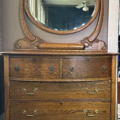 Antique Oak Dresser With Beveled Mirror And Wooden Casters