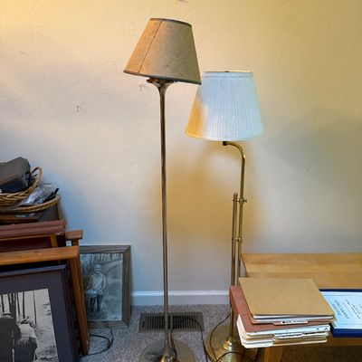 Sale Photo Thumbnail #13: Pair of vintage metal floor lamps, including a chrome-finish tulip base lamp with a woven shade and a brass-tone swing-arm adjustable reading lamp.