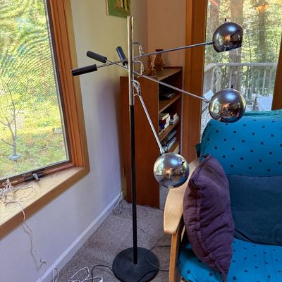 Sale Photo Thumbnail #16: Mid-century modern chrome three-light eyeball floor lamp featuring adjustable boom arms and counterweights.