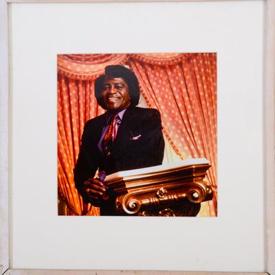FRAMED PHOTOGRAPH OF JAMES BROWN.