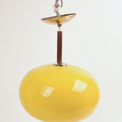 ITALIAN PENDANT LAMP WITH YELLOW GLASS SHADE.