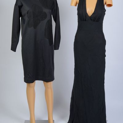 TWO BLACK DESIGNER DRESSES.