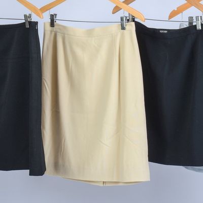 SIX GIORGIO ARMANI SKIRTS, SIZES 46 AND 48.