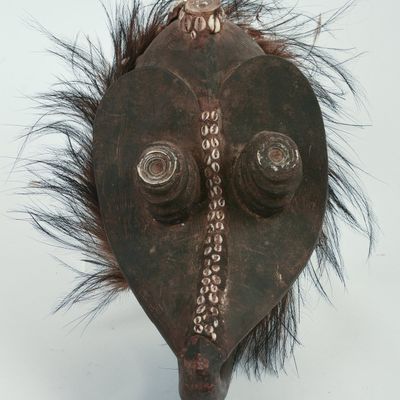 AFRICAN CARVED WOODEN MASK.