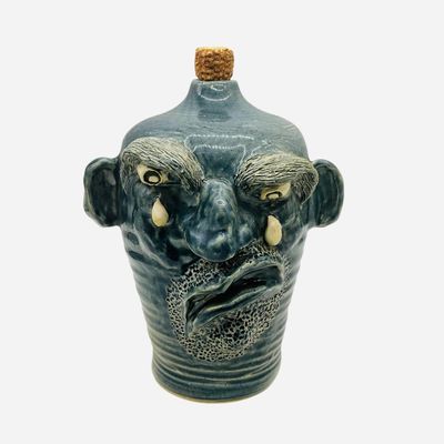 Sale Photo Thumbnail #201: S.P. High Crying Eyed Face Jug Signed