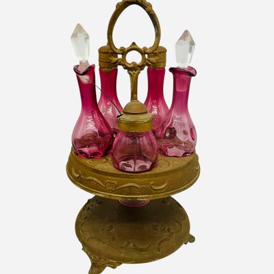 Sale Photo Thumbnail #249: Vintage Five Bottle Cranberry Thumbprint Cruet Castor Set