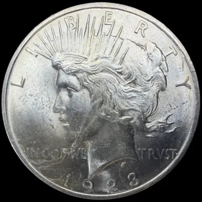 Sale Photo Thumbnail #33: 1923 Peace silver dollar coin, showing the obverse featuring Lady Liberty.