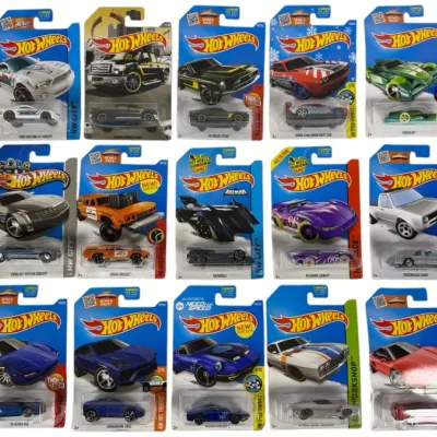 Sale Photo Thumbnail #172: Collection of 15 unopened Hot Wheels die-cast toy cars in original blister pack cards, featuring various models including the Batmobile and Ford Mustang.