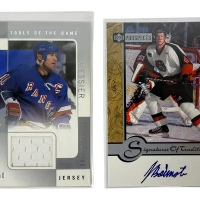 Sale Photo Thumbnail #19: Pair of hockey trading cards in clear protective sleeves, including a Mark Messier SP Game Used jersey card numbered 068/350 and an Upper Deck Prospects Jay Bouwmeester Signatures of Tradition autographed card.