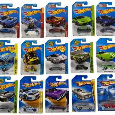 Sale Photo Thumbnail #173: Collection of 15 vintage and modern Hot Wheels die-cast toy cars, sealed in original blister card packaging.