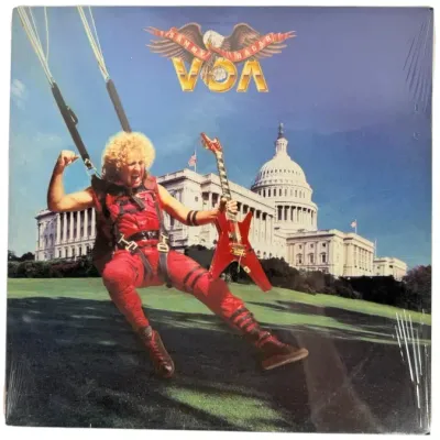 Sale Photo Thumbnail #122: Sealed vinyl album copy of Sammy Hagar's VOA, released in 1984. The cover features Hagar skydiving with an electric guitar in front of the U.S. Capitol.