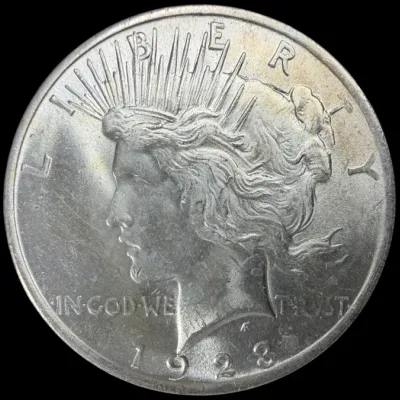 Sale Photo Thumbnail #40: Obverse view of a 1923 Peace silver dollar coin featuring Lady Liberty.