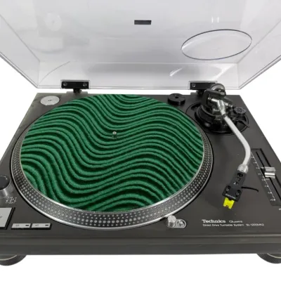 Sale Photo Thumbnail #2: Technics SL-1200MK2 direct drive turntable in a black finish, featuring a green patterned slipmat, Stanton cartridge, and a clear dust cover.
