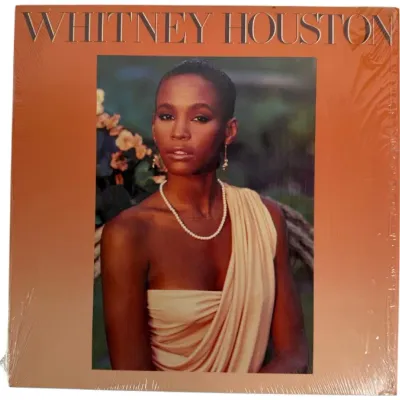 Sale Photo Thumbnail #126: Sealed vinyl copy of Whitney Houston's self-titled debut album, released in 1985 by Arista Records.