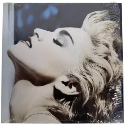 Sale Photo Thumbnail #140: Madonna "True Blue" vinyl record album released in 1986, sealed in its original shrink wrap.