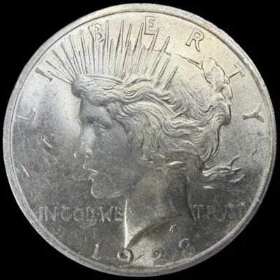 Sale Photo Thumbnail #37: Obverse side of a 1923 Peace silver dollar featuring Lady Liberty in profile.