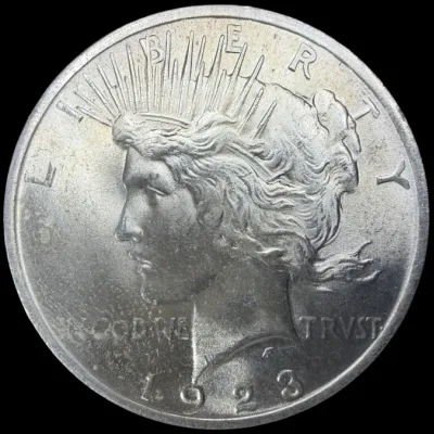 Sale Photo Thumbnail #41: Obverse view of a 1923 Peace silver dollar coin featuring Lady Liberty.