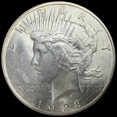 Sale Photo Thumbnail #24: Obverse view of a 1923 Peace silver dollar coin featuring Lady Liberty.