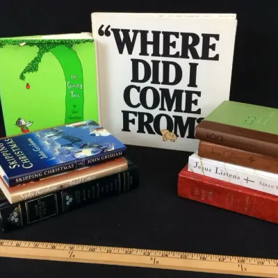 Sale Photo Thumbnail #42: Collection of assorted books, including Shel Silverstein's 'The Giving Tree', Peter Mayle's 'Where Did I Come From?', and various Christian devotional titles.