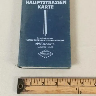 Sale Photo Thumbnail #7: Vintage German Phoenix Hauptstrassen Karte pocket map book with blue cloth cover, measuring approximately 3 inches wide.