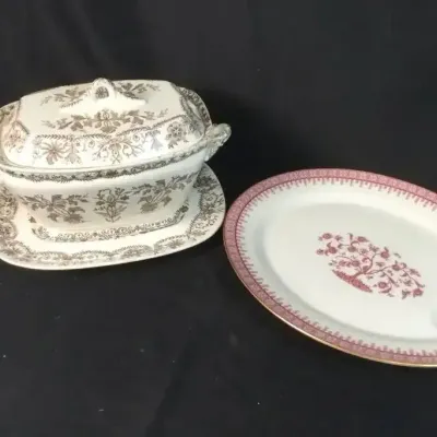 Sale Photo Thumbnail #77: Vintage transferware tureen with lid and underplate alongside an oval serving platter with pink floral accents.