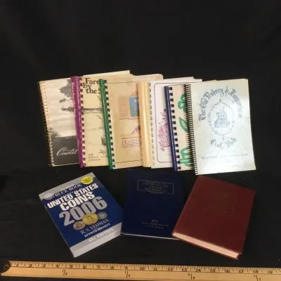 Sale Photo Thumbnail #95: Collection of vintage spiral-bound community cookbooks and coin guidebooks, including the 2006 official Blue Book of United States Coins.