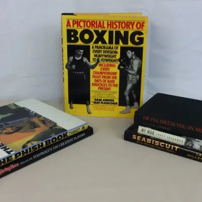 Sale Photo Thumbnail #19: Collection of coffee table and non-fiction books, including 'A Pictorial History of Boxing', 'The Phish Book', and 'Seabiscuit'.