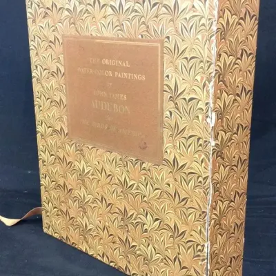 Sale Photo Thumbnail #34: Slipcased edition of "The Original Water-Color Paintings by John James Audubon for The Birds of America," featuring a patterned marbled design with light shelf wear.