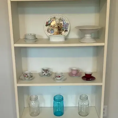 A Shelving Unit With Unclaimed Treasures