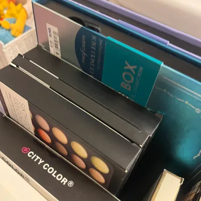 Sale Photo Thumbnail #219: Assortment of boxed eyeshadow palettes, including City Color Sixth Edition 120 Color Palette and Profusion cosmetics.