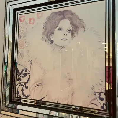 Sale Photo Thumbnail #42: Vintage 1970s fashion illustration print of a woman in a fur collar, set in a mirrored Art Deco style frame with striped details.