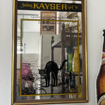 Sale Photo Thumbnail #248: Vintage Julius Kayser & Co. Zeller Schwarze Katz wine advertising mirror in a wooden frame.