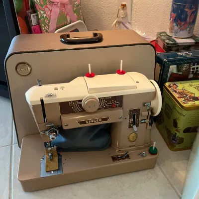 Sale Photo Thumbnail #6: Vintage tan and cream Singer Stylist sewing machine with matching hardshell carrying case.