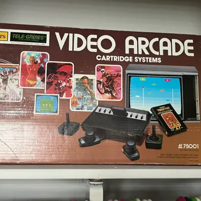 Sale Photo Thumbnail #214: Vintage Sears Tele-Games Video Arcade cartridge system in its original box, late 1970s.