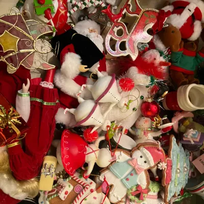 Sale Photo Thumbnail #165: Collection of assorted vintage and contemporary Christmas ornaments and decorations, featuring Santa Claus figures, gingerbread people, snowmen, and sleigh motifs.