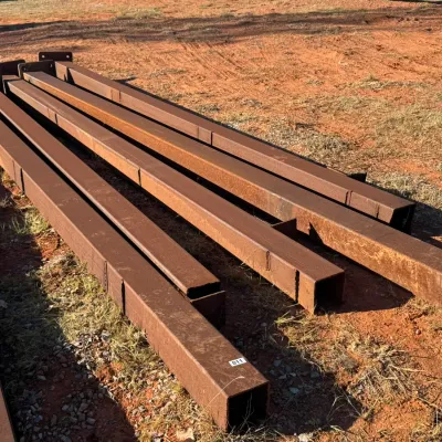 Sale Photo Thumbnail #7: Set of heavy-duty steel square tubing beams with welded end mounting plates.