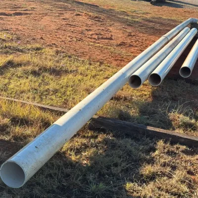 Sale Photo Thumbnail #5: Assorted lengths of white plastic PVC conduit.