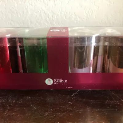 4-Piece Metallic Candle Set in Red, Green, Silver, and Gold