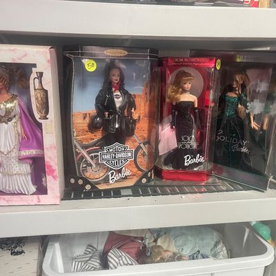 Sale Photo Thumbnail #101: Collection of boxed special edition Barbie dolls, including Harley-Davidson Barbie, Solo in the Spotlight Barbie, and 2004 Holiday Barbie.