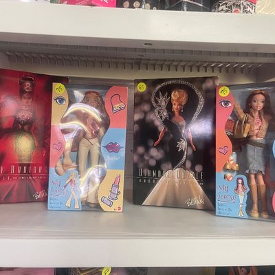Sale Photo Thumbnail #103: Collection of mint-in-box collector dolls, including Bob Mackie Ruby Radiance Barbie, Diamond Dazzle Barbie, and two My Scene dolls from the early 2000s.