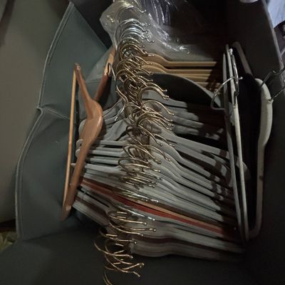 Sale Photo Thumbnail #107: Large collection of assorted clothes hangers. 