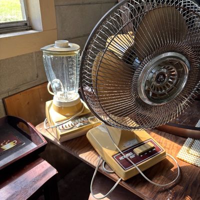 Sale Photo Thumbnail #68: Vintage Holmes Air electric desk fan in harvest gold alongside a matching vintage glass-pitcher blender.