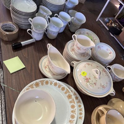 Sale Photo Thumbnail #72: Large assortment of vintage fine china dishware sets, including teacups, saucers, gravy boats, and Corelle Butterfly Gold dinnerware.