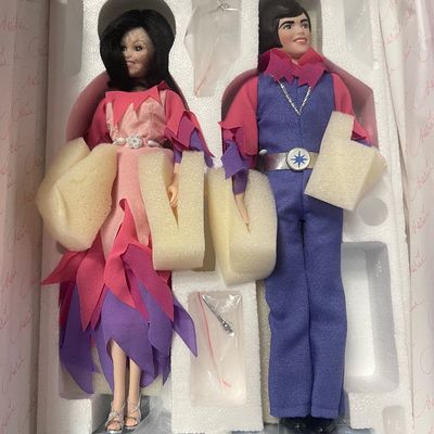 Sale Photo Thumbnail #97: Vintage Donny and Marie Osmond collector doll set in original styrofoam packaging, featuring colorful stage costumes and display stands.