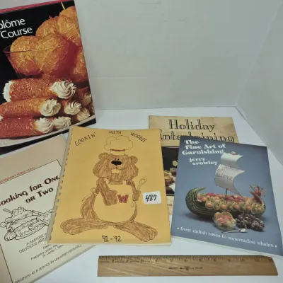 Sale Photo Thumbnail #835: Collection of vintage cookbooks and culinary instruction booklets, including Grand Diplôme Cooking Course and The Fine Art of Garnishing.